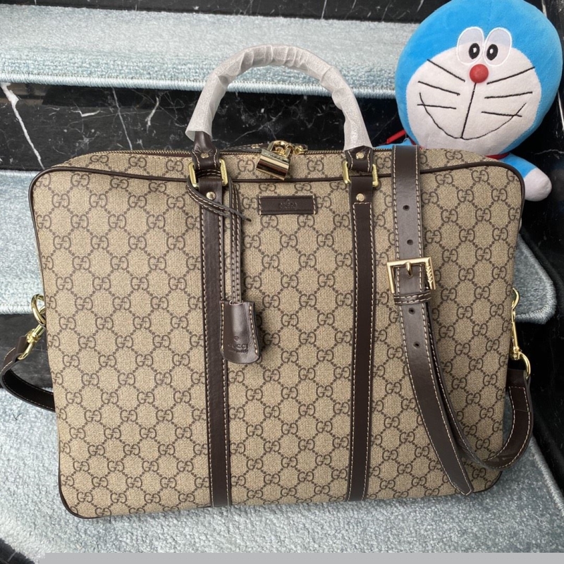 G*u*i top handle bags